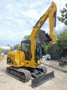 2018 Caterpillar 306D mini excavator, rear three-quarter view