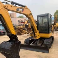 2023 Caterpillar 306D mini excavator, front three-quarter view