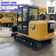 2024 Caterpillar 305.5E2 mini excavator, rear three-quarter view 2024 Caterpillar 305.5E2 mini excavator, rear three-quarter view