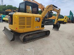 2021 Caterpillar 305.5E2 mini excavator, rear three-quarter view