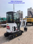 2024 Bobcat E20 mini excavator, rear three-quarter view