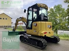 2023 Caterpillar 303.5CR mini excavator, rear three-quarter view