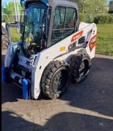2024 Bobcat S450 skid steer loader, front three-quarter view