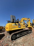 2023 Komatsu PC240LC-8 crawler excavator, rear three-quarter view