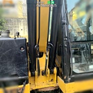 2019 Caterpillar 310 crawler excavator boom and cab detail