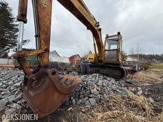 1985 Mitsubishi MS120-2 excavator, front three-quarter view