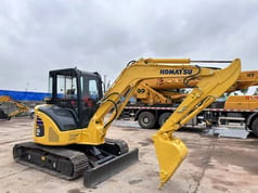 2024 Komatsu PC-55MR mini excavator, side profile view