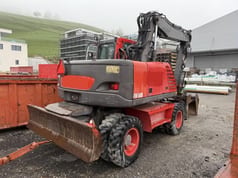 2005 Volvo EW160B wheel excavator, rear three-quarter view