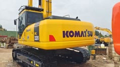 2023 Komatsu PC220-7 crawler excavator, rear three-quarter view