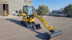 2023 Komatsu PC24MR-5 mini excavator, front three-quarter view