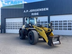 2018 New Holland W190D LONG REACH wheel loader, front three-quarter view