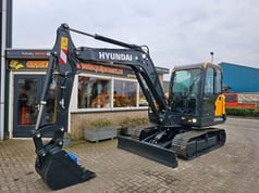 2025 Hyundai HX60PRO mini excavator, side profile view