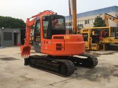 2022 Hitachi ZX75US crawler excavator, rear three-quarter view 2022 Hitachi ZX75US crawler excavator, rear three-quarter view