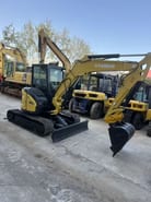 2024 Yanmar VIO55-6 mini excavator, front three-quarter view