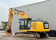 2012 Caterpillar 329E crawler excavator, side view