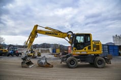 2018 Komatsu PW148-10 wheel excavator, side profile view