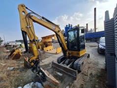 2022 Caterpillar 304 crawler excavator, front three-quarter view