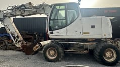 2005 CASE WX165 wheel excavator, side view