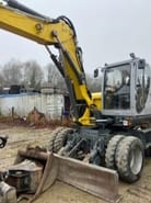 2020 Wacker Neuson EW100 wheel excavator, front three-quarter view