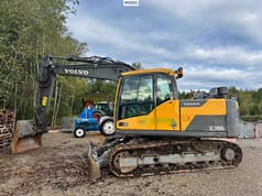 2013 Volvo EC140DL crawler excavator, side view