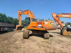 2025 Doosan DX300LCA crawler excavator, rear three-quarter view