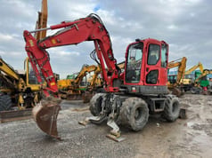2011 Komatsu PW98MR-8 wheel excavator, front three-quarter view