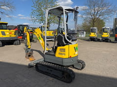2022 Wacker Neuson EZ17E mini excavator, rear three-quarter view