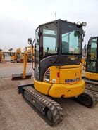 2024 Komatsu PC35MR-5 mini excavator, rear three-quarter view