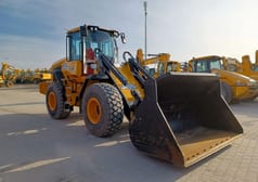 2022 JCB 427HT wheel loader, front three-quarter view