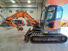 2015 Develon DX85R-7 mini excavator, side profile view