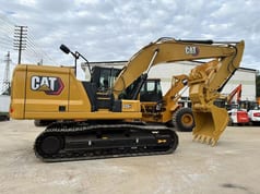 2022 Caterpillar 320GC crawler excavator, side view