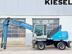 2016 Fuchs MHL320D перегружатель материалов, вид сбоку