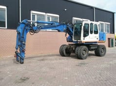 2002 Atlas 1404 wheel excavator side view 2002 Atlas 1404 wheel excavator side view