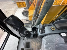 2026 XCMG XE135GA Crawler Excavator operator station with a digital display and joystick controls.
