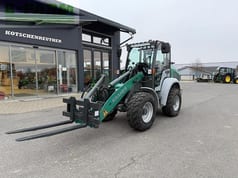 2023 Kramer KL255 wheel loader with pallet forks, front three-quarter view