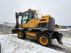 2014 Volvo EW140D wheel excavator, rear three-quarter view