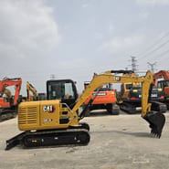 2023 Caterpillar 305.5E mini excavator side view