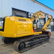 2016 Caterpillar 320E crawler excavator, rear three-quarter view