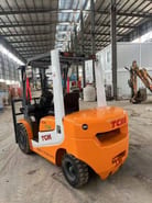 2024 TCM FD 30 forklift, rear three-quarter view