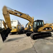 Escavatore cingolato Caterpillar 320C del 2008, vista laterale