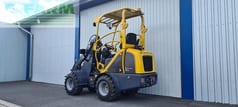 2025 Eurotrac W11 mini excavator, rear three-quarter view