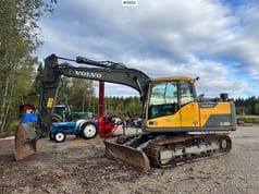 2013 Volvo EC140DL crawler excavator, side view
