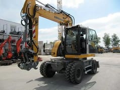 2022 Liebherr A 913 Compact G6.0-D wheel excavator, front three-quarter view