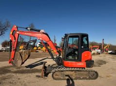 2019 Kubota KX057-4 mini excavator, side view