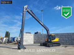 2025 Hyundai R245LR Crawler Excavator with long reach boom extended forward and bucket resting on the ground.