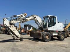 2008 New Holland MH-PLUS wheel excavator side view