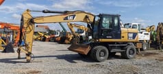 2011 Caterpillar M315D wheel excavator, side profile view 2011 Caterpillar M315D wheel excavator, side profile view