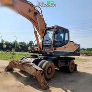 2010 Hyundai Robex 265W-9 wheel excavator, side view