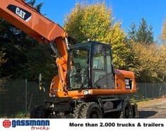 2011 Caterpillar M318D wheel excavator, side view
