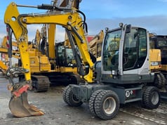 2021 Wacker Neuson EW65 wheel excavator, front three-quarter view
